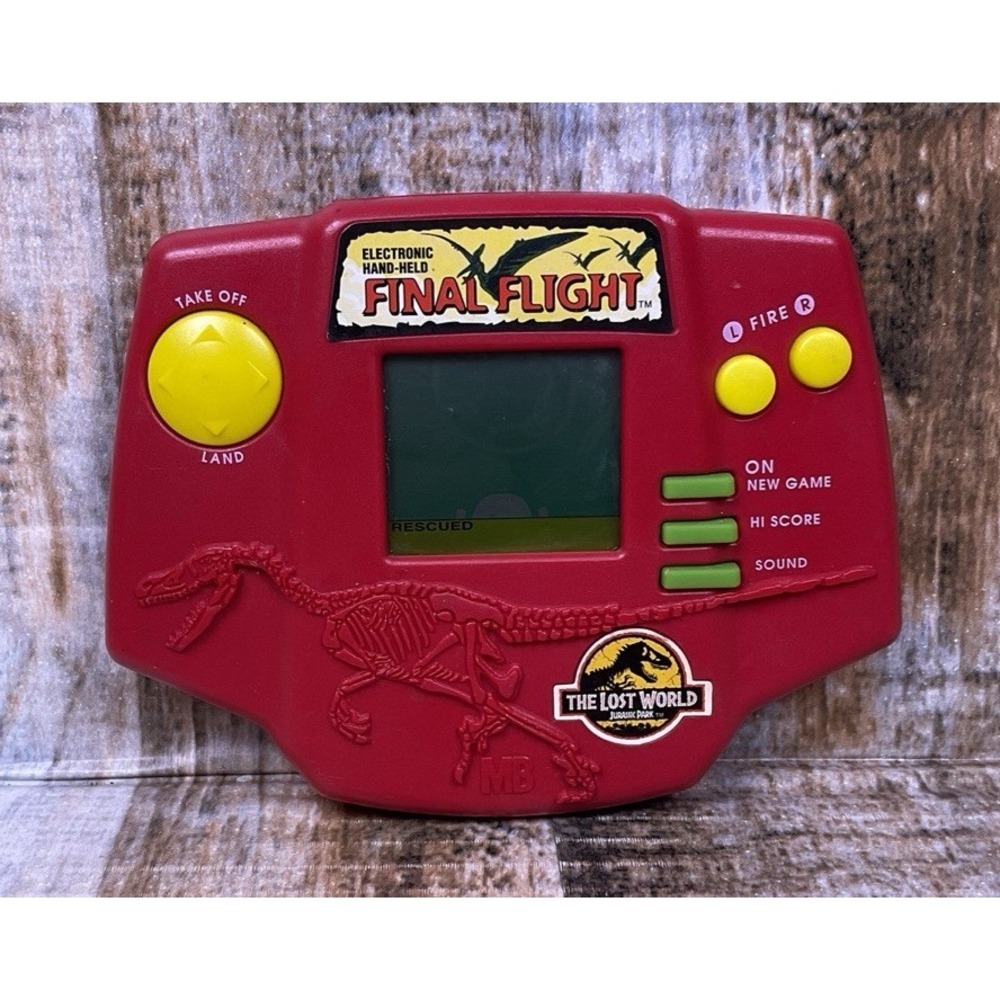 Jurassic Park The Lost World Final Flight Hand-held Electronic Game WORKS 1996